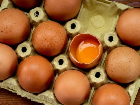 Eggs in an egg cup Stock Photos