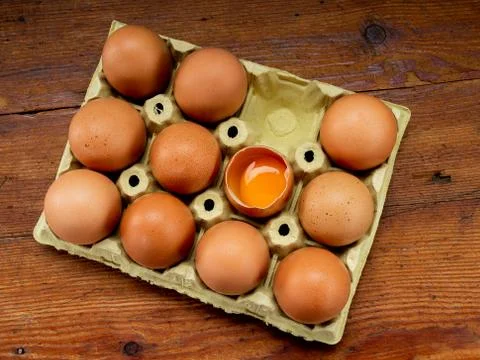 Eggs in an egg cup Stock Photos