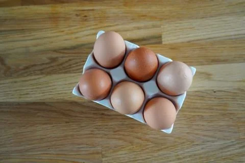 Eggs in a egg holder 库存照片