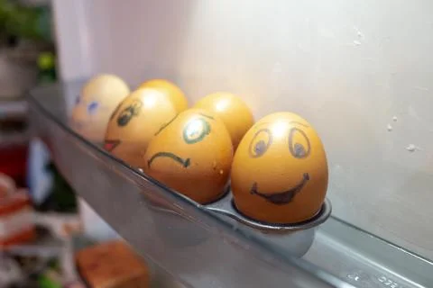 Eggs with emoticons. Stock Photos