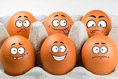 Eggs with faces and various expressions. Stock Photos