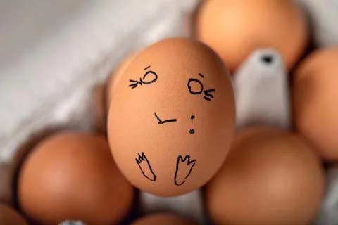 Eggs Faces, drawnigs on eggs on blur background Stock Photos
