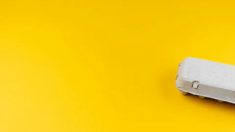 Eggs with faces move in a cardboard box Stock Footage 127103768