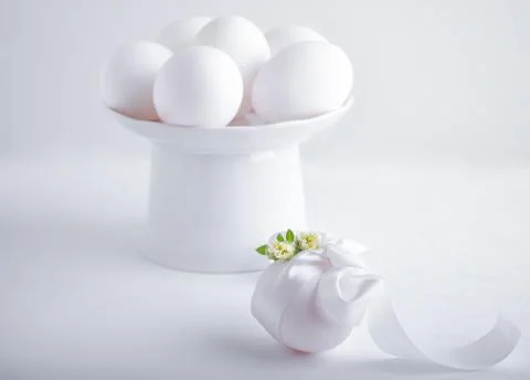 Eggs with flowers on a white background. Easter Symbols Stock Photos