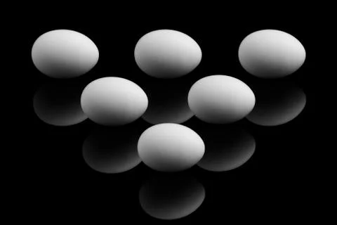 Eggs in the form of a triangle Stock Photos