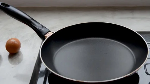 Eggs fried in a pan, close-up shot Stock Footage 86011197