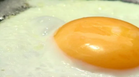 Eggs fried in a pan Stock Footage