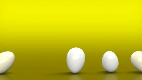 Eggs on gradient background. Eggs fall in to the frame, you can Stock Footage 125280906