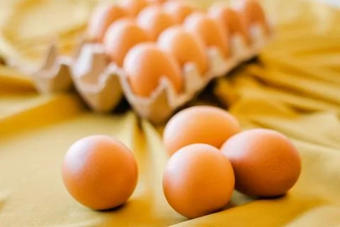 Eggs in a gray container Stock Photos