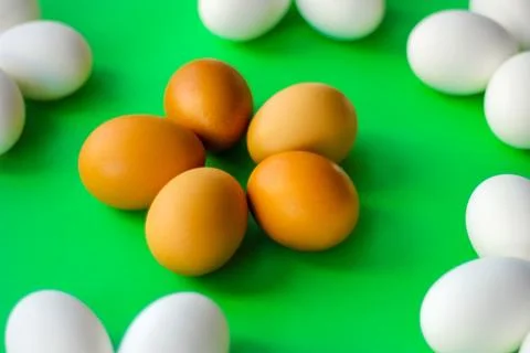 Eggs on a green background. horizontal image, top view Stock Photos