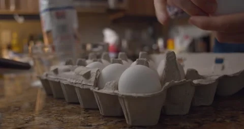 Eggs hand kitchen Stock Footage 147297397