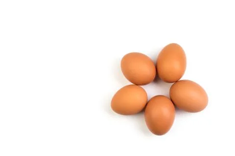 Eggs isolated on white background. Copy space for text. Top view Stock Photos