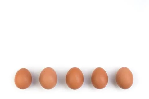 Eggs isolated on white background. Copy space for text. Top view Stock Photos