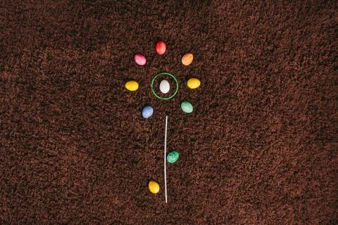 Eggs lying on the carpet. abstract flower.flat lay. easter aggs Stock Photos