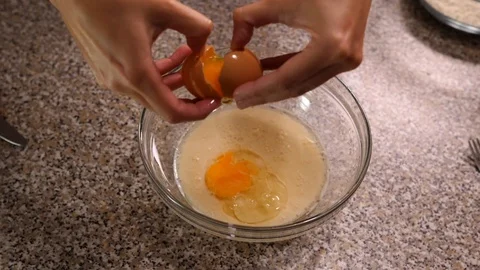 Eggs in milk slow motion Stock Footage 96232949