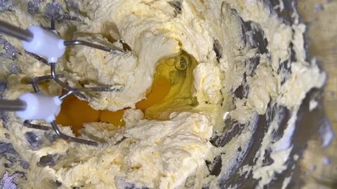 Eggs mixed with mixer with dough Stock-Footage 230078161