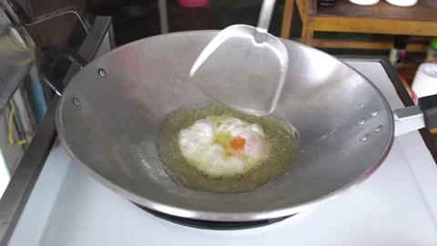 Eggs nearly finished frying Stock Footage