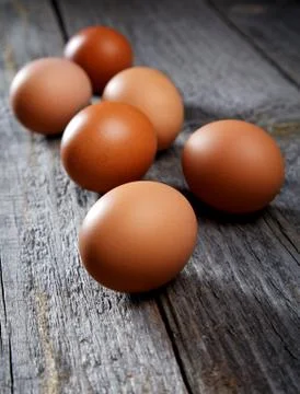 Eggs on an old rural table Stock Photos