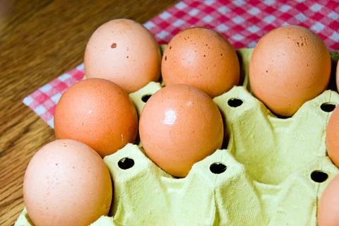 Eggs in the package Stock Photos