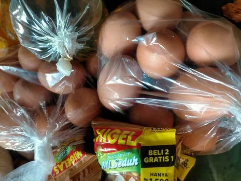 Eggs packed in plastic Stock Photos