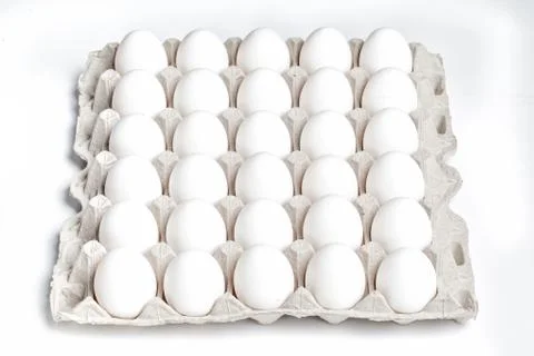 Eggs in packing on a white background Stock Photos