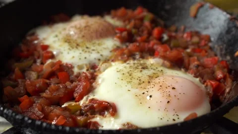 Eggs on a pan Stock Footage 131855881