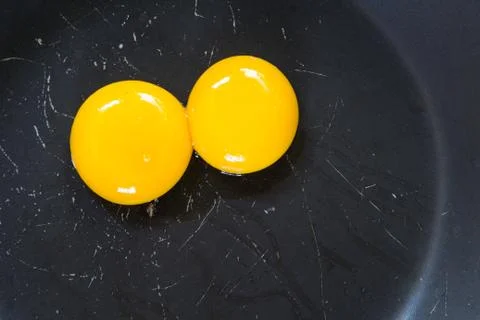 Eggs in the pan Stock Photos