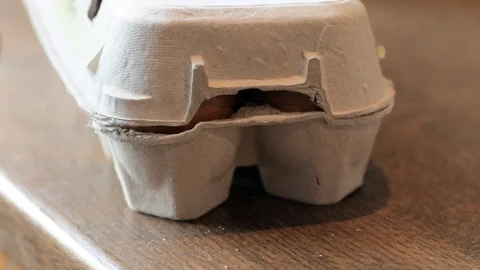 Eggs in paper box Video stock 92476736