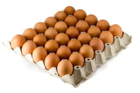 Eggs in paper tray Stock Photos