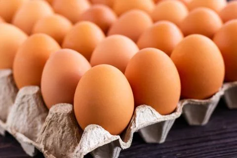 Eggs in paper tray Stock Photos