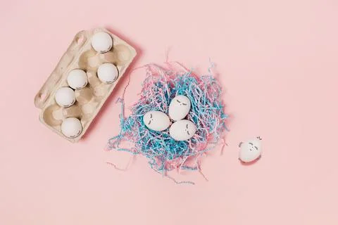 Eggs on a pink background. Stock Photos