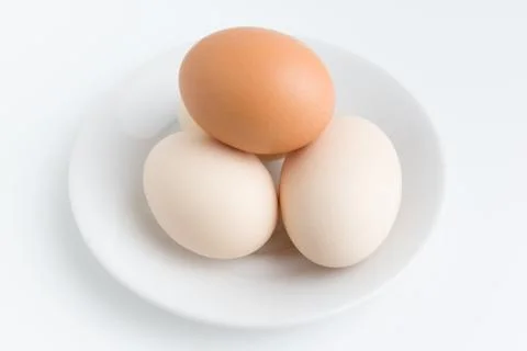 Eggs on plate Stock Photos