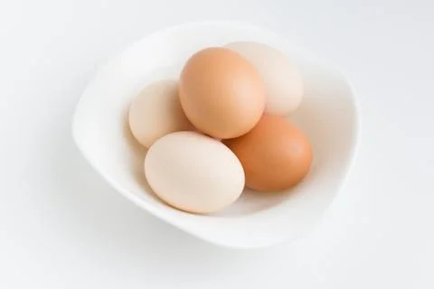 Eggs on plate Stock Photos