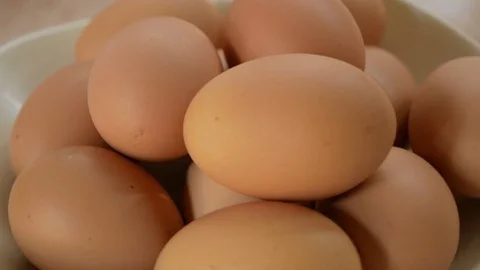 Eggs on plate rotation Stock Footage