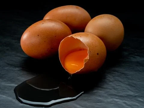 Eggs on a red background Stock Photos