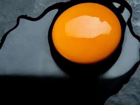 Eggs on a red background Stock Photos