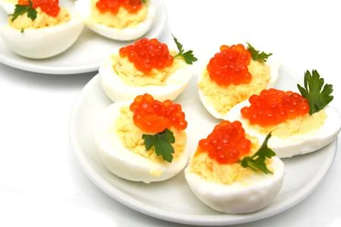 Eggs with red caviar Stock Photos