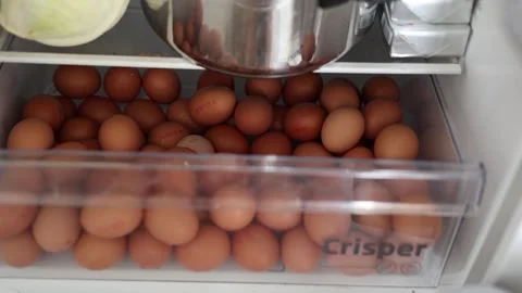 Eggs in the refrigerator at home Stock Footage 285424529