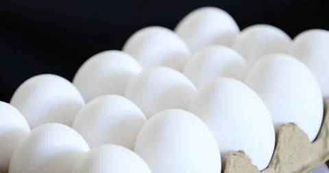 Eggs rotating at black background 1 Stock Footage 146745315