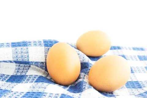 Eggs set on table mat Stock Photos
