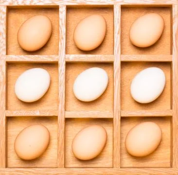 Eggs in shadow box horizontal Stock Photos
