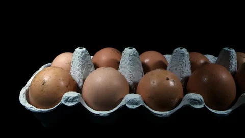 Eggs sliding left to right as a macro slider shot Stock Footage 128456214