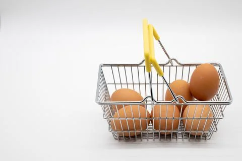 Eggs in a small basket for purchase Stock Photos