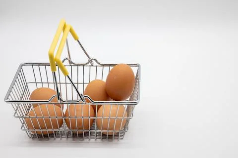 Eggs in a small basket for purchase Stock Photos