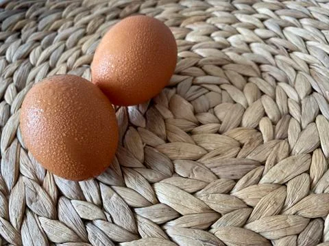 Eggs on a straw ground Stock Photos