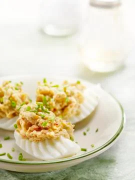 Eggs stuffed with salad Stock Photos