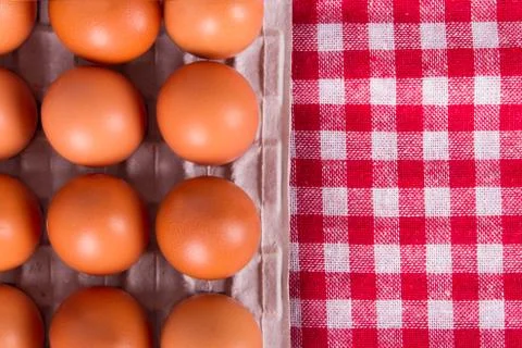 Eggs on table cloth Stock Photos