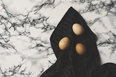 Eggs on table Stock Photos