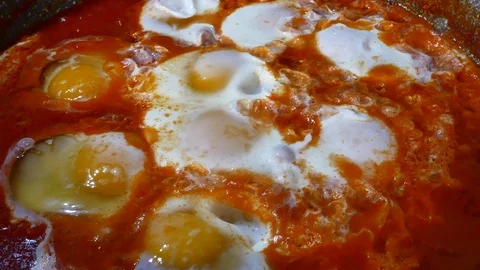 Eggs with Tomato Sauce Video 4K Stock Footage 103452610