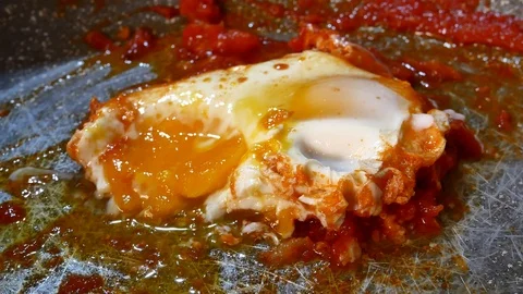 Eggs with Tomato Sauce Video 4K Stock Footage 103454418